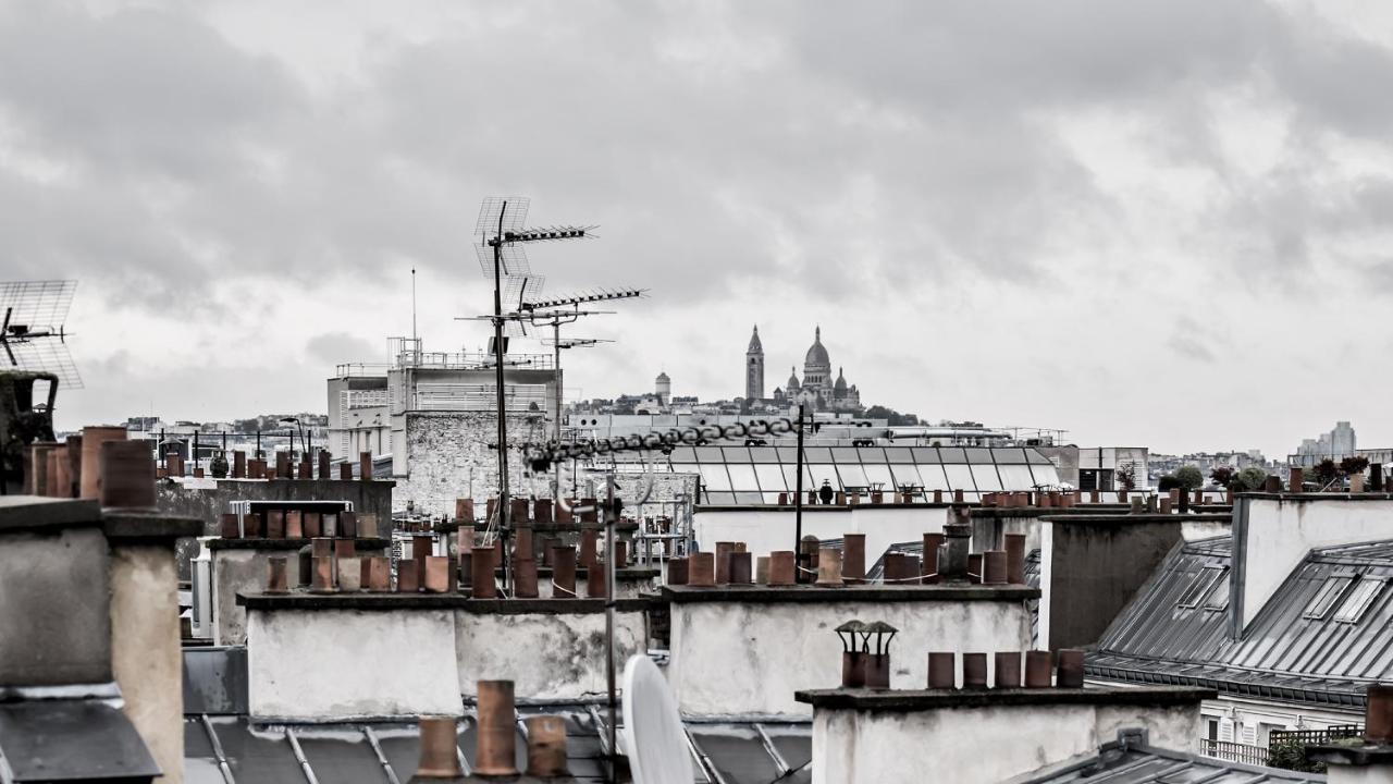Monsieur George Hotel & Spa - Champs-Elysees Paris Eksteriør billede View of Paris rooftops